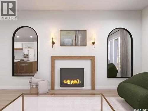8 Oak Bay, Shields, SK - Indoor Photo Showing Living Room With Fireplace