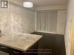 202 - 131 UPPER DUKE CRESCENT Markham, ON L6G 0C9