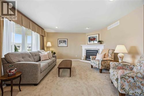 5600 Blackwell Sideroad Unit# 453, Sarnia, ON - Indoor Photo Showing Living Room With Fireplace