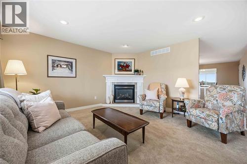 5600 Blackwell Sideroad Unit# 453, Sarnia, ON - Indoor Photo Showing Living Room With Fireplace