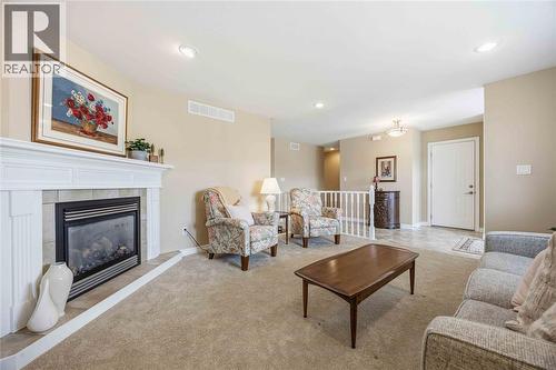 5600 Blackwell Sideroad Unit# 453, Sarnia, ON - Indoor Photo Showing Living Room With Fireplace