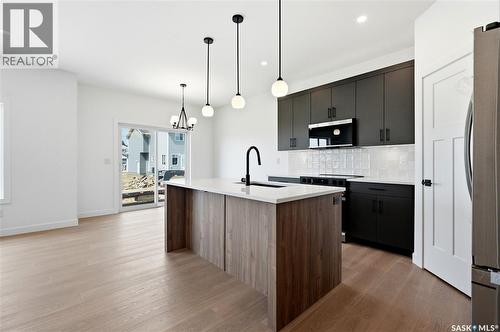 255 Doran Way, Saskatoon, SK - Indoor Photo Showing Kitchen With Upgraded Kitchen