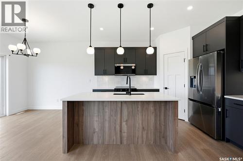 255 Doran Way, Saskatoon, SK - Indoor Photo Showing Kitchen With Upgraded Kitchen