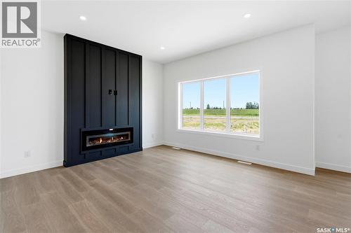 255 Doran Way, Saskatoon, SK - Indoor Photo Showing Living Room With Fireplace