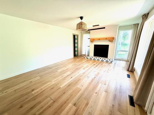 715 St Clair, Keewatin, ON - Indoor With Fireplace