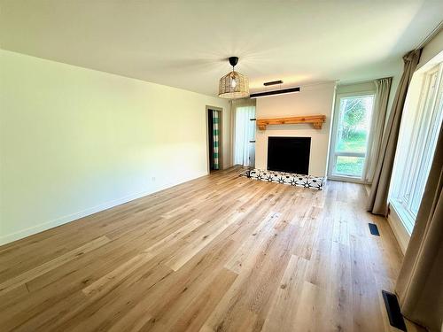 715 St Clair, Keewatin, ON - Indoor With Fireplace