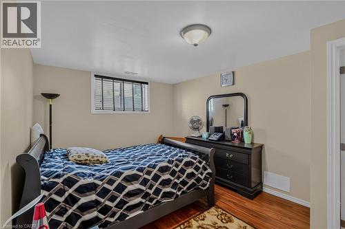 Bedroom #3 in lower level, laminate flooring, closets - 49 Millcroft Drive, Simcoe, ON - Indoor Photo Showing Bedroom
