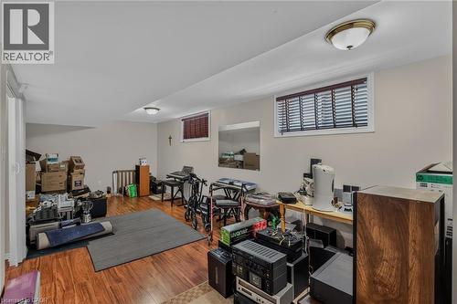 laminate floor two sets of windows lower level - 49 Millcroft Drive, Simcoe, ON - Indoor