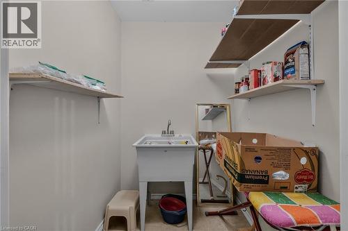 sink shelving tile floor - 49 Millcroft Drive, Simcoe, ON - Indoor
