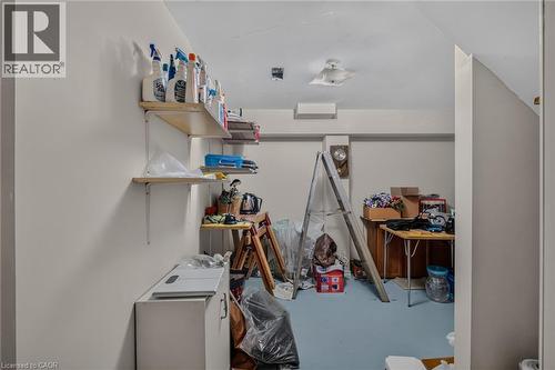 cement floor storage room - 49 Millcroft Drive, Simcoe, ON - Indoor Photo Showing Laundry Room
