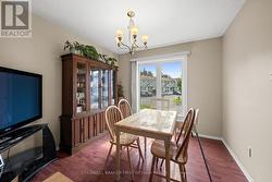 Dining room with Chandelier & Large Window. - 