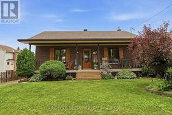 Handy front porch to enjoy on summer evenings. - 