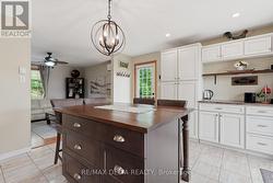 Extra cupboards on the opposite wall. - 