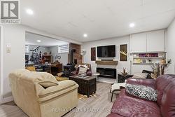Large lower level family room w/wood stove. - 