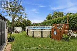 Backyard with above ground pool. - 