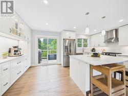 Built-in coffee bar and cabinets; walk-out to deck - 
