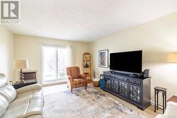 Living Room and patio doors to Balcony - 