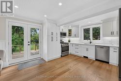 Kitchen With Walkout to Large Deck - 