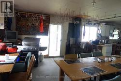 Patio Doors to the deck which faces the water - 