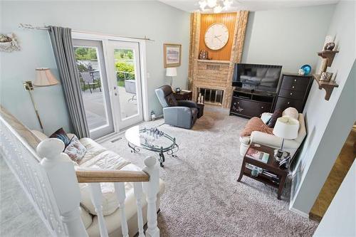 6 Parkwater Cr, Winnipeg, MB - Indoor Photo Showing Living Room With Fireplace