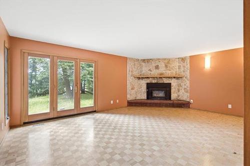 520 Christie Rd, Winnipeg, MB - Indoor Photo Showing Living Room With Fireplace