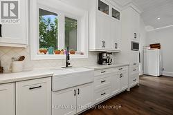 Farm House Sink Over Looking Deck Area - 