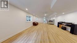 Finished Lower Level Space with Large Windows - 