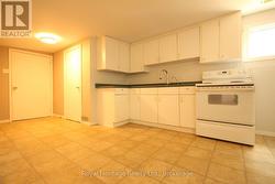 LOWER LEVEL KITCHEN - 