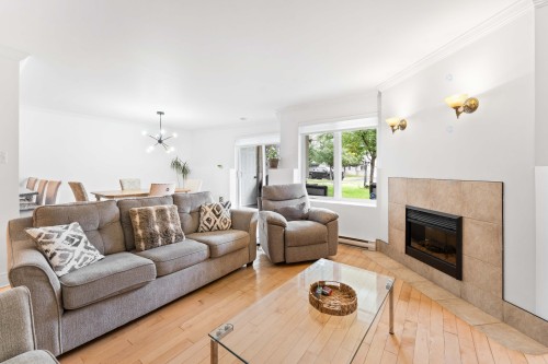 Living Room - 2-4771 Boul. Cleroux, Laval (Chomedey), QC - Indoor Photo Showing Living Room With Fireplace