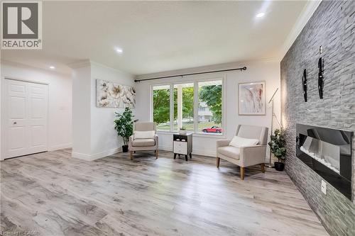 85 Foxhunt Road, Waterloo, ON - Indoor Photo Showing Living Room With Fireplace