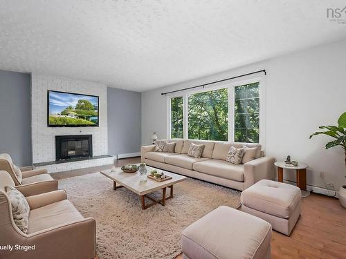 1 Silverside Drive, Waverley, NS - Indoor Photo Showing Living Room With Fireplace