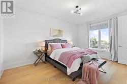 Bdrm with access to semi-private balcony & ensuite - 