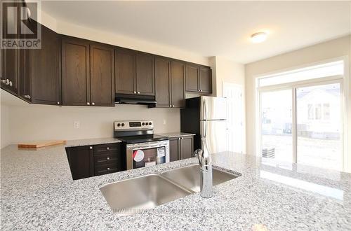 Imported from oreb - 236 Atima Circle, Ottawa, ON - Indoor Photo Showing Kitchen With Double Sink