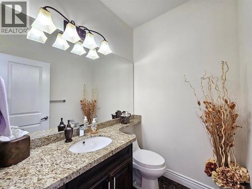 Powder room - 1494 Montenegro Drive, Kelowna, BC - Indoor Photo Showing Bathroom