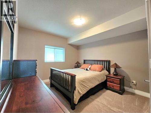 Suite bedroom - 1494 Montenegro Drive, Kelowna, BC - Indoor Photo Showing Bedroom