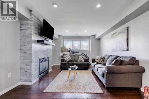 53 Antonio, Leamington, ON - Indoor Photo Showing Living Room With Fireplace