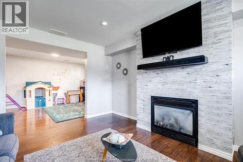 53 Antonio, Leamington, ON - Indoor Photo Showing Living Room With Fireplace