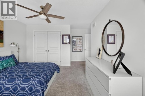 Spacious room featuring light gray carpeting and white walls - 87 Boyd Boulevard, Thamesford, ON - Indoor Photo Showing Bedroom