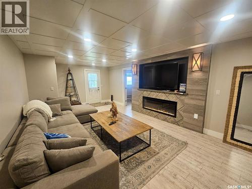 59 Snedden Crescent, Maple Bush Rm No. 224, SK - Indoor Photo Showing Living Room With Fireplace