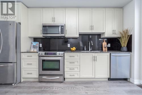 Quartz counters, and quartz backsplash - 112 Hollywood Court, Cambridge, ON - Indoor Photo Showing Kitchen With Stainless Steel Kitchen With Upgraded Kitchen