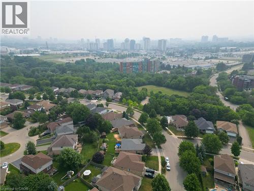 Residential neighborhood with tree-lined streets, featuring a mix of single-family homes and mature landscaping - 249 Dearborn Boulevard, Waterloo, ON - Outdoor With View