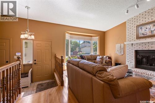 3147 Harding Street, Regina, SK - Indoor Photo Showing Living Room With Fireplace