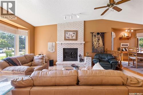 3147 Harding Street, Regina, SK - Indoor Photo Showing Living Room With Fireplace