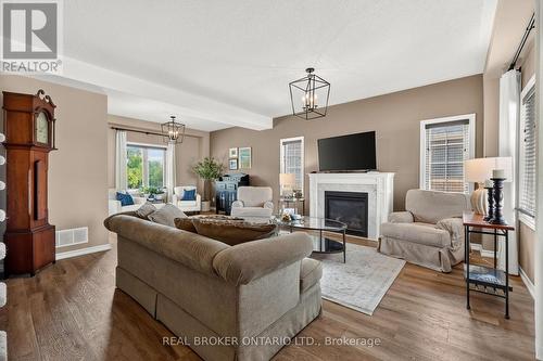 36 Beverly Street, Springwater, ON - Indoor Photo Showing Living Room With Fireplace