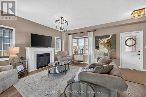 36 Beverly Street, Springwater, ON - Indoor Photo Showing Living Room With Fireplace
