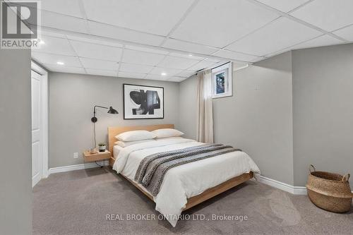 Photos may have been altered. - 36 Beverly Street, Springwater, ON - Indoor Photo Showing Bedroom