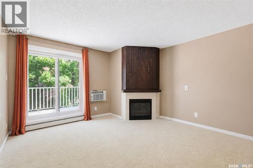 301 1121 1A Mckercher Drive, Saskatoon, SK - Indoor With Fireplace