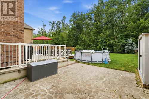 81 Trail Boulevard, Springwater, ON - Outdoor With Above Ground Pool