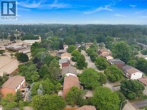 Residential neighborhood featuring mature trees and established homes - 421 Bairstow Crescent, Waterloo, ON - Outdoor With View