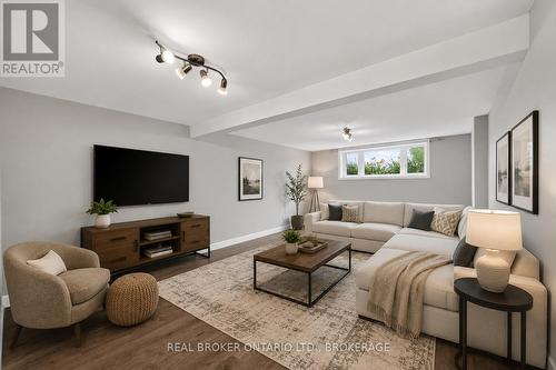 Photo has been virtually staged - 2199 Burke Avenue, Cornwall, ON - Indoor Photo Showing Living Room
